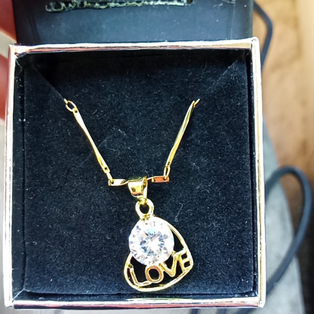 14k heart pendent with dimond